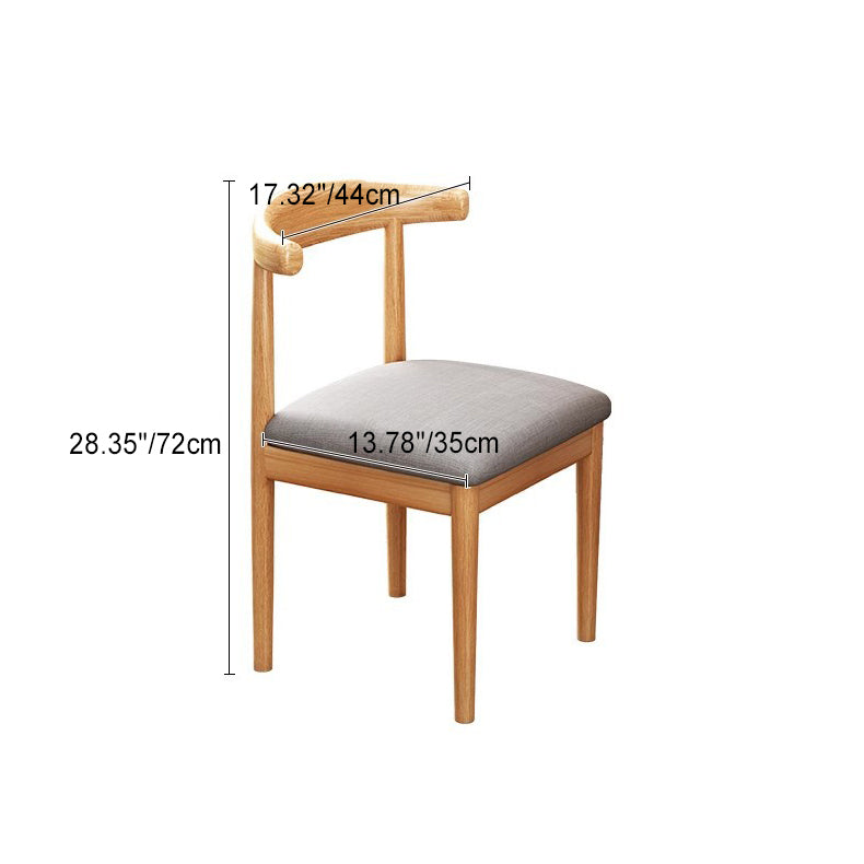 Chaise de salle à manger contemporaine en forme de coin de vache nordique moderne avec dossier carré rembourré en tissu coton lin PU cuir cadre en acier 