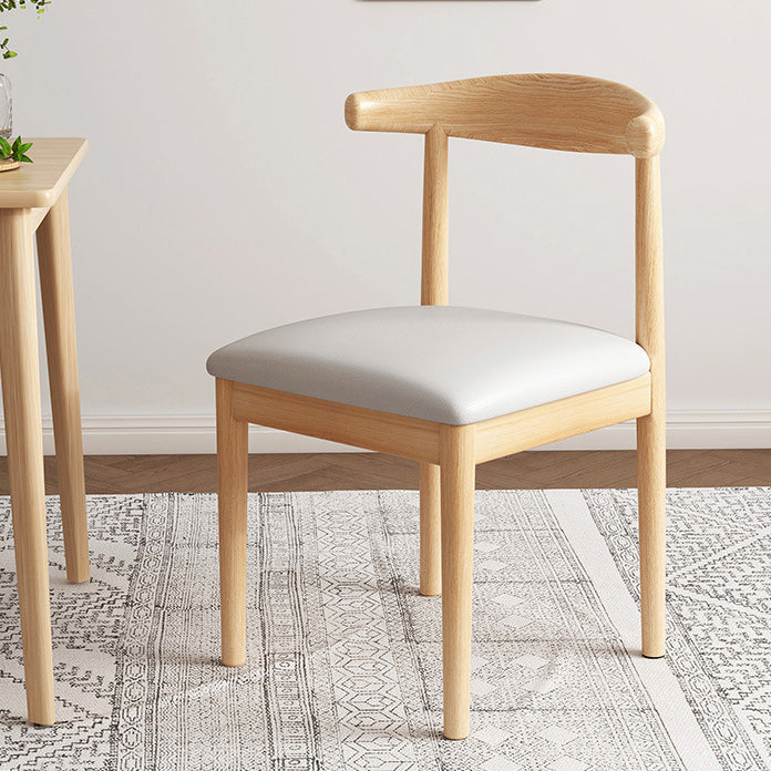 Chaise de salle à manger contemporaine en forme de coin de vache nordique moderne avec dossier carré rembourré en tissu coton lin PU cuir cadre en acier 