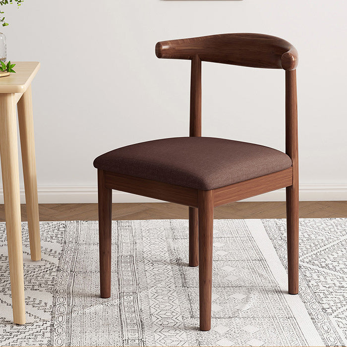 Chaise de salle à manger contemporaine en forme de coin de vache nordique moderne avec dossier carré rembourré en tissu coton lin PU cuir cadre en acier 