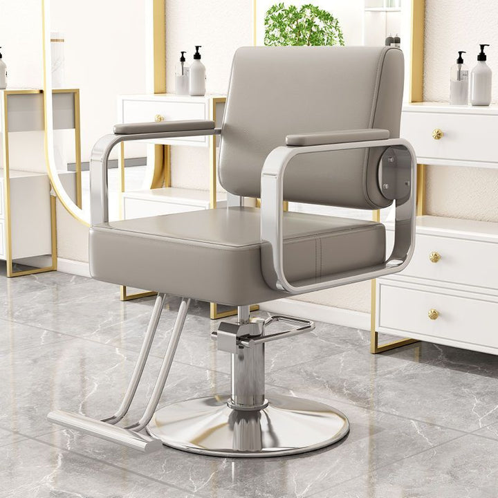 Silla giratoria moderna y minimalista de acero inoxidable y hierro galvanizado en color plateado, con cuero sintético tipo napa, espuma, respaldo y reposabrazos, para sala de estar 