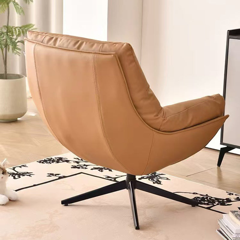 Moderner minimalistischer drehbarer Akzentstuhl mit geschwungener Form aus Kunstleder, Eisen und Schaumstoff mit Rückenlehne und Armlehnen für das Wohnzimmer 