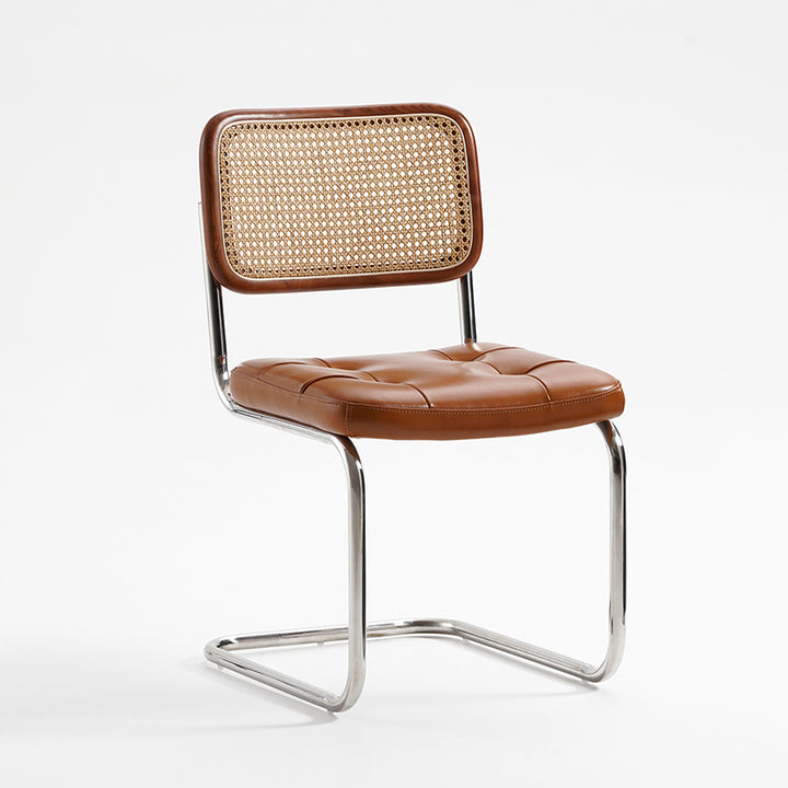 Chaise de salle à manger traditionnelle vintage en arc en acier inoxydable avec dosseret en cuir, éponge, plastique et rotin tissé sans accoudoirs 
