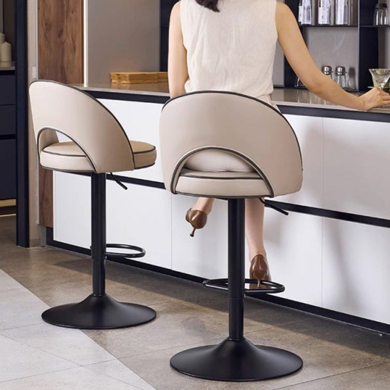 Taburete de bar redondo elevable de cuero y metal con esponja de simplicidad moderna, respaldo, reposapiés y giro para cocina 