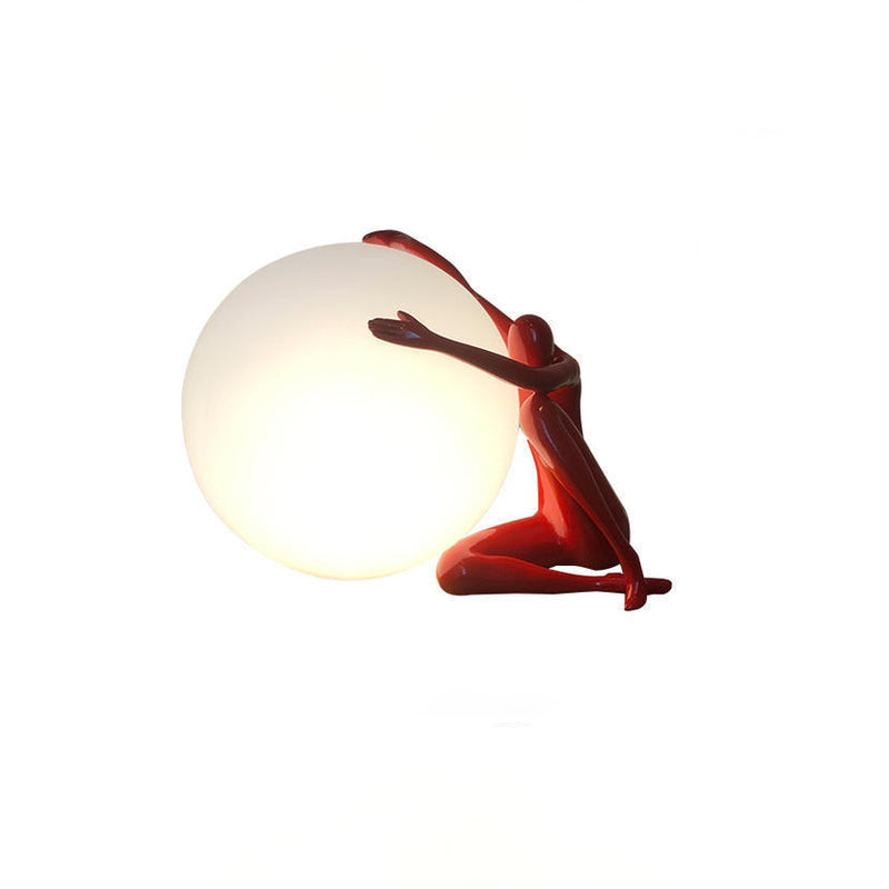 Moderne Art-Déco-Person, die einen Sitzball umarmt, Harz PE 1-Licht Tischlampe für das Schlafzimmer 