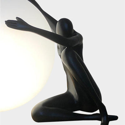 Moderne Art-Déco-Person, die einen Sitzball umarmt, Harz PE 1-Licht Tischlampe für das Schlafzimmer 