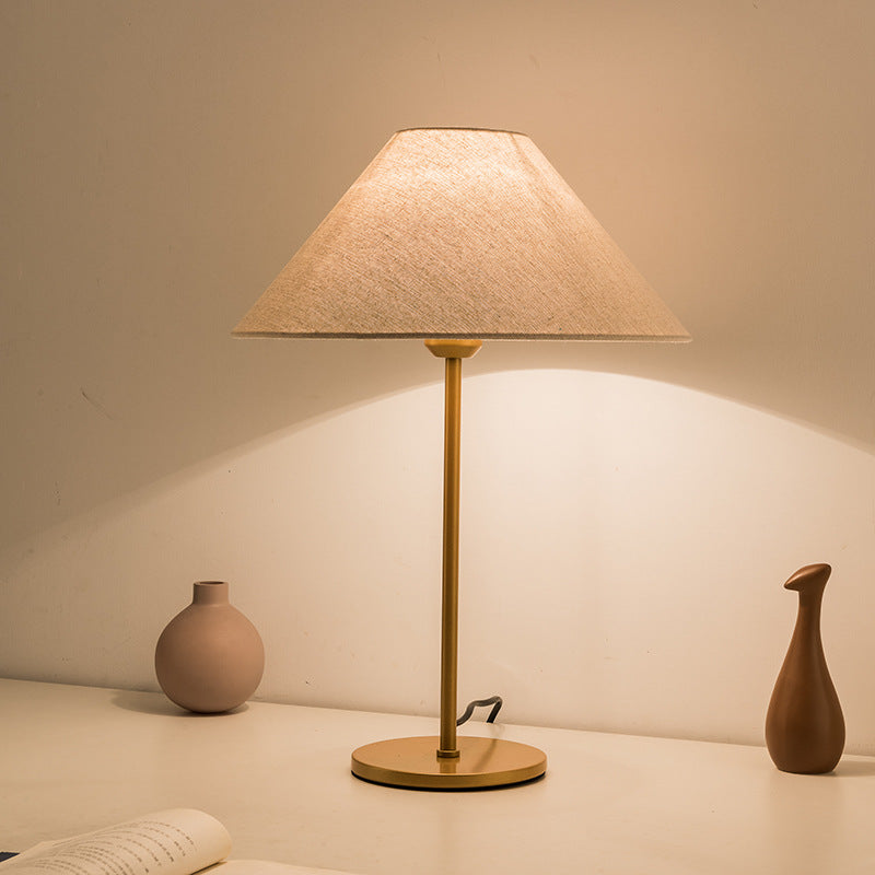 Modern Minimalist Conical Trapezoidal Warm Atmosphere Iron Fabric 1-Light Table Lamp For Bedroom