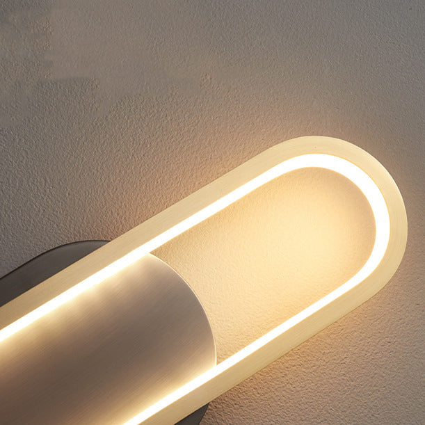 Moderne minimalistische Wandleuchte aus Messing und Acryl mit ovalem LED für Schlafzimmer und Wohnzimmer 