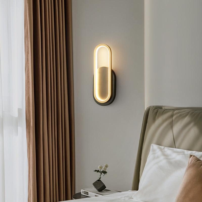Moderne minimalistische Wandleuchte aus Messing und Acryl mit ovalem LED für Schlafzimmer und Wohnzimmer 