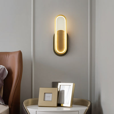 Moderne minimalistische Wandleuchte aus Messing und Acryl mit ovalem LED für Schlafzimmer und Wohnzimmer 