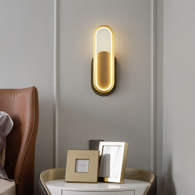 Moderne minimalistische Wandleuchte aus Messing und Acryl mit ovalem LED für Schlafzimmer und Wohnzimmer 