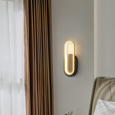 Moderne minimalistische Wandleuchte aus Messing und Acryl mit ovalem LED für Schlafzimmer und Wohnzimmer 