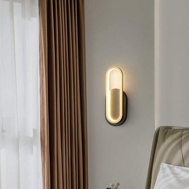 Moderne minimalistische Wandleuchte aus Messing und Acryl mit ovalem LED für Schlafzimmer und Wohnzimmer 