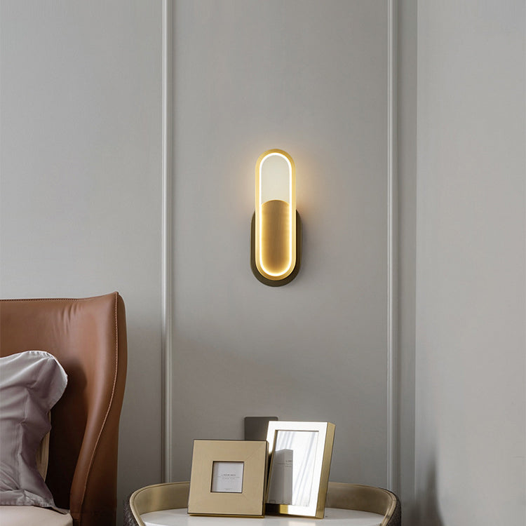 Moderne minimalistische Wandleuchte aus Messing und Acryl mit ovalem LED für Schlafzimmer und Wohnzimmer 