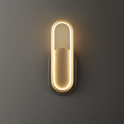 Moderne minimalistische Wandleuchte aus Messing und Acryl mit ovalem LED für Schlafzimmer und Wohnzimmer 