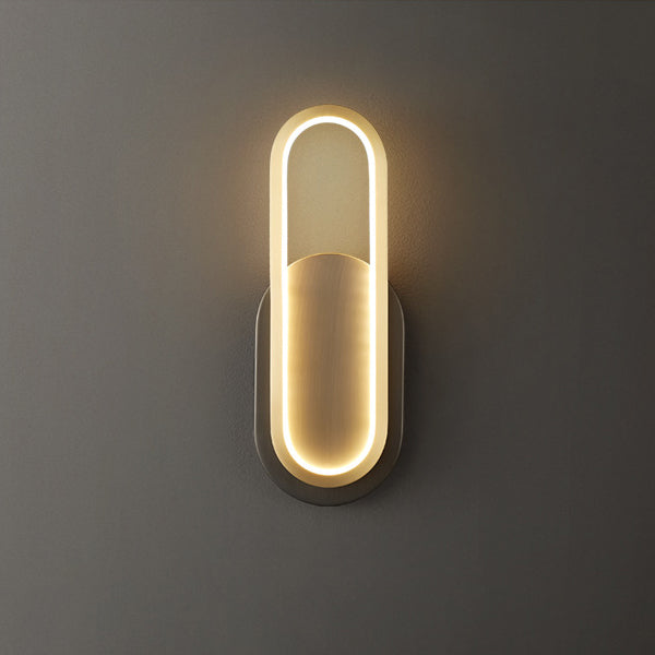 Moderne minimalistische Wandleuchte aus Messing und Acryl mit ovalem LED für Schlafzimmer und Wohnzimmer 