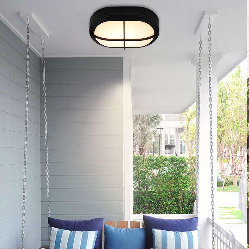 Luz de pared exterior LED ovalada de aluminio y PC minimalista moderna, impermeable para patio y balcón 