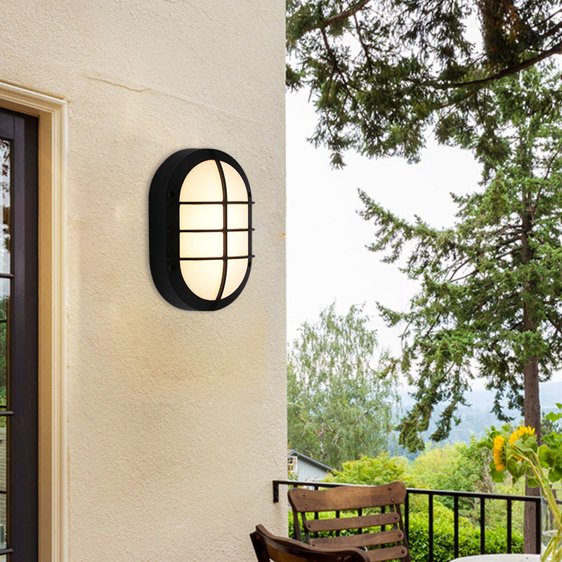 Luz de pared exterior LED ovalada de aluminio y PC minimalista moderna, impermeable para patio y balcón 