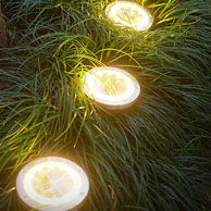 Lumière solaire extérieure LED ronde en acier inoxydable en plastique minimaliste moderne pour jardin 