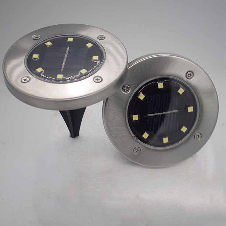 Lumière solaire extérieure LED ronde en acier inoxydable en plastique minimaliste moderne pour jardin 
