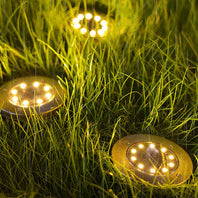 Lumière solaire extérieure LED ronde en acier inoxydable en plastique minimaliste moderne pour jardin 