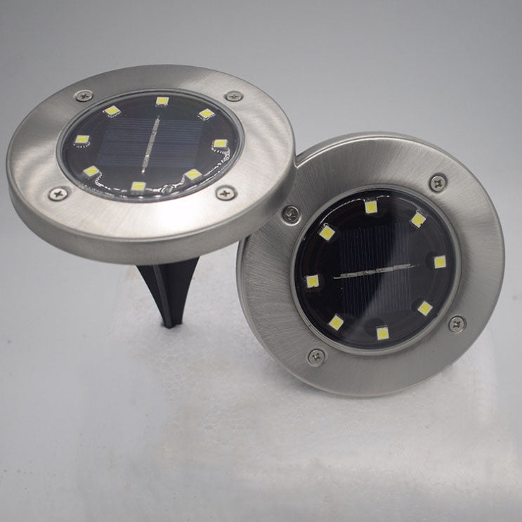 Lumière solaire extérieure LED ronde en acier inoxydable en plastique minimaliste moderne pour jardin 