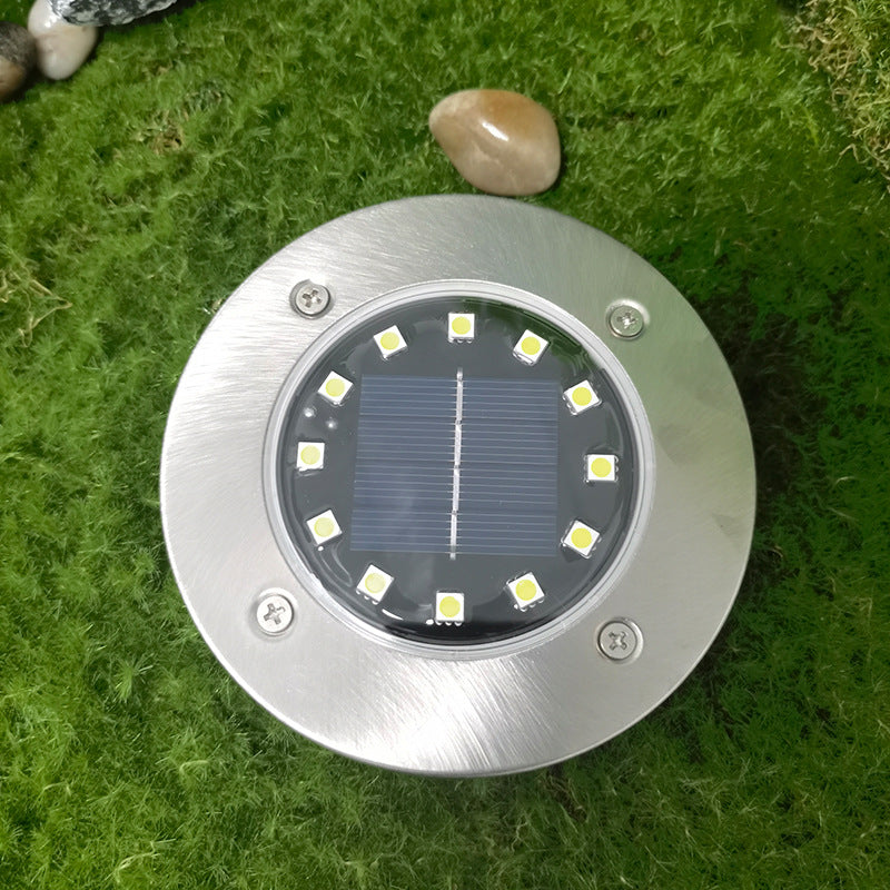Lumière solaire extérieure LED ronde en acier inoxydable en plastique minimaliste moderne pour jardin 