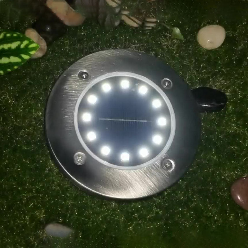 ضوء LED شمسي خارجي دائري من الفولاذ المقاوم للصدأ والبلاستيك بتصميم حديث وبسيط للحديقة 