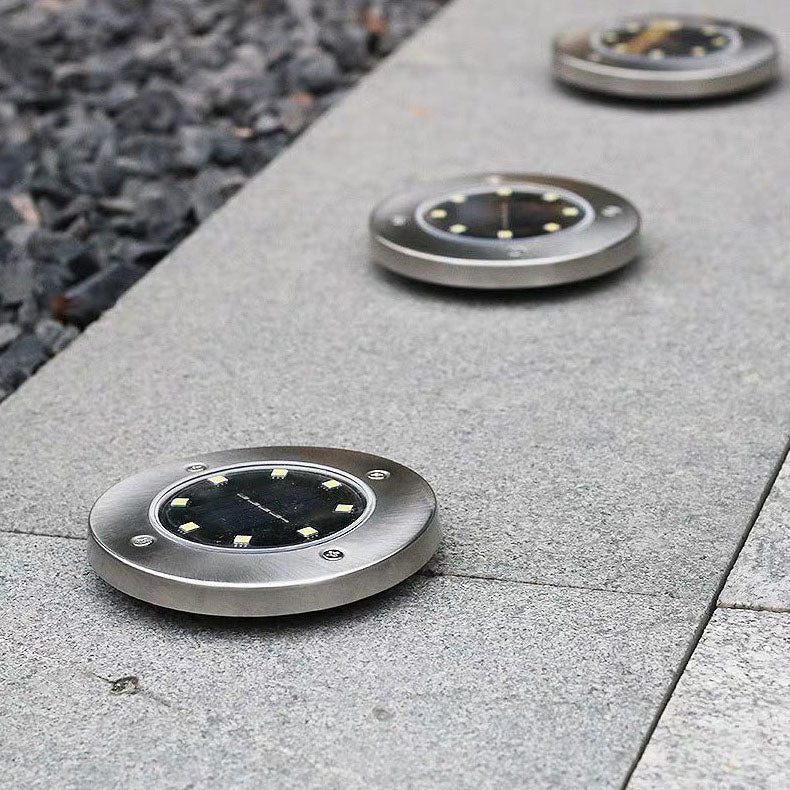 Lumière solaire extérieure LED ronde en acier inoxydable en plastique minimaliste moderne pour jardin 