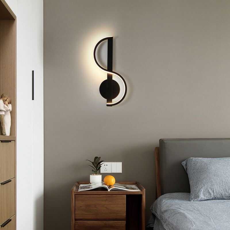 Zeitgenössische kreative Eisen- und Silikon-Musikkurve LED-Wandleuchte für Schlafzimmer und Wohnzimmer 