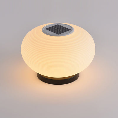 Lumière extérieure moderne minimaliste PE ovale à LED solaire et étanche pour jardin et patio 