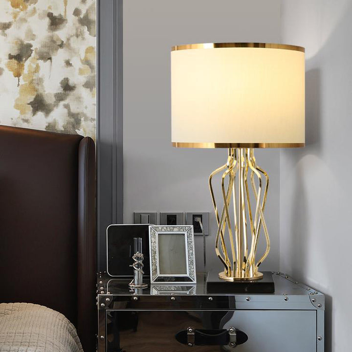 Zeitgenössische kreative Stoff-Metall-Marmor-Gebogene runde 1-Licht-Tischlampe für das Schlafzimmer 