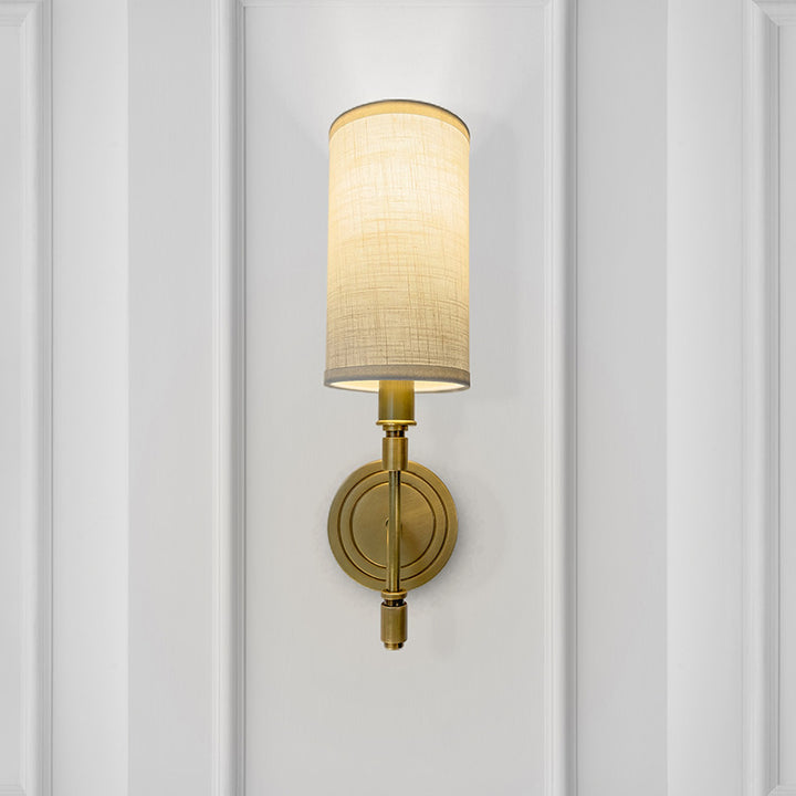 Moderne minimalistische Leinen-Messing-runde zylindrische 1-Licht-Wandleuchte für das Schlafzimmer 
