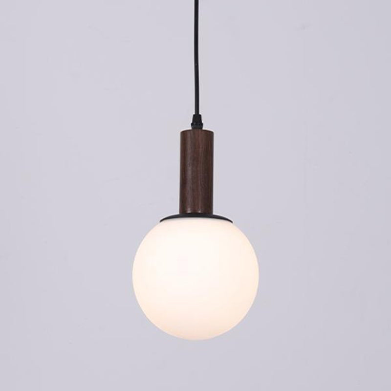 Moderne minimalistische Glas-Eisen-Zylinder-Globe 1-Licht-Pendelleuchte für das Wohnzimmer 