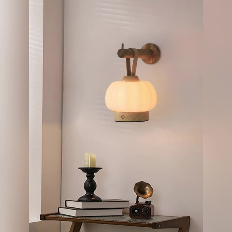 Zeitgenössische nordische wiederaufladbare Holz-PE- und Leder-Kürbis-förmige hängende LED-Wandleuchte Nachttischlampe für das Bett 