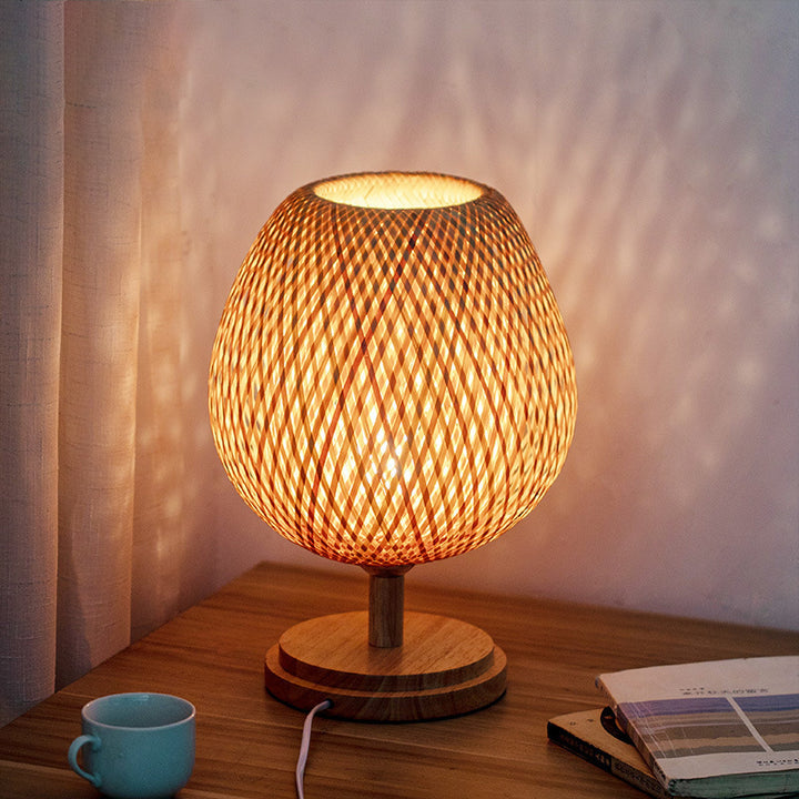 Lámpara de mesa ovalada de 1 luz de tejido tradicional japonés de bambú, madera y metal para dormitorio y comedor 