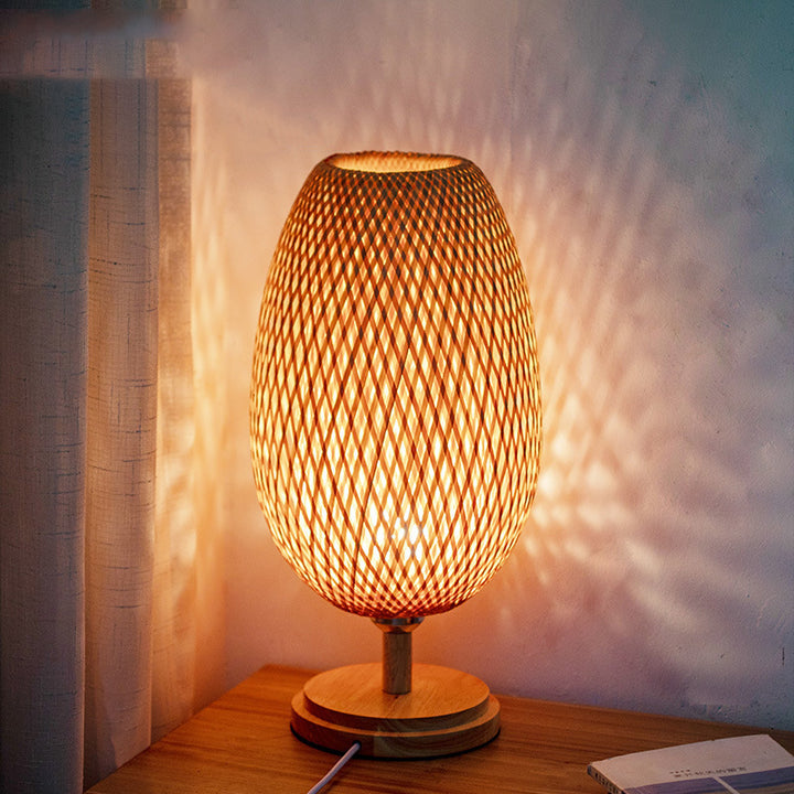 Lámpara de mesa ovalada de 1 luz de tejido tradicional japonés de bambú, madera y metal para dormitorio y comedor 