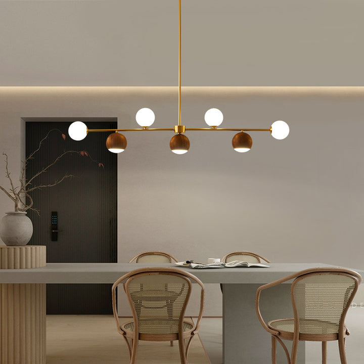 Zeitgenössischer nordischer Walnuss-Messing-Glas-Kugel 4-Licht LED-Kronleuchter Insellicht für das Esszimmer 