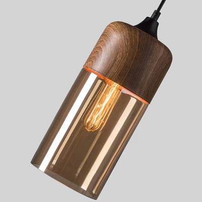 Suspension contemporaine industrielle en fer et verre en forme de cylindre globe à 1 lumière pour salle à manger 