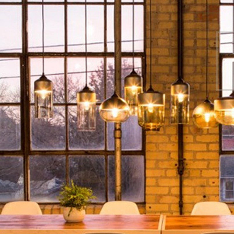 Suspension contemporaine industrielle en fer et verre en forme de cylindre globe à 1 lumière pour salle à manger 