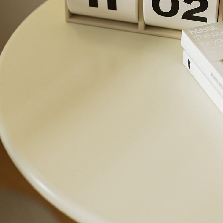 Table basse ronde moderne minimaliste en fibre de densité moyenne et métal avec base style bougeoir pour salon 