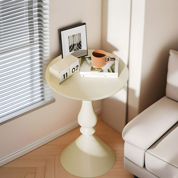 Table basse ronde moderne minimaliste en fibre de densité moyenne et métal avec base style bougeoir pour salon 