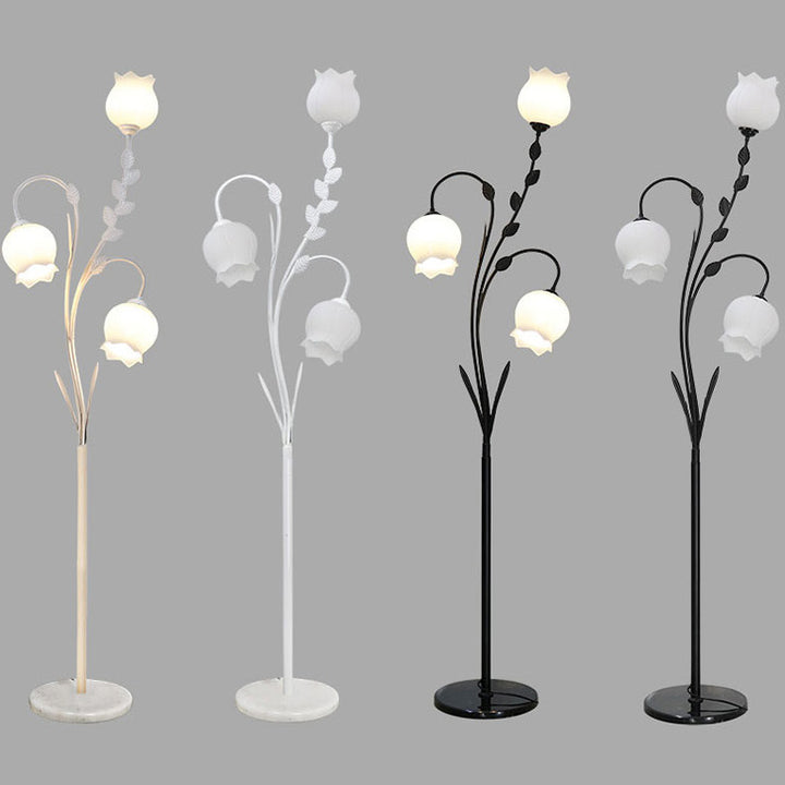Lampadaire moderne minimaliste en fer en forme de fleur avec trois lumières en verre pour salon 