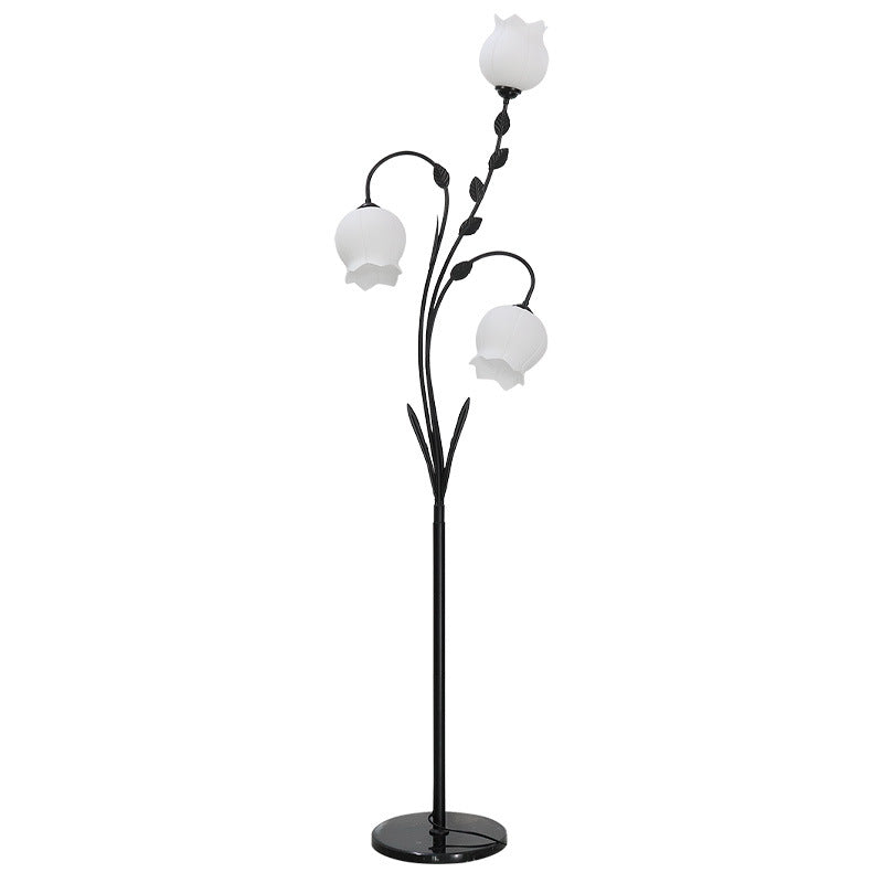 Lampadaire moderne minimaliste en fer en forme de fleur avec trois lumières en verre pour salon 