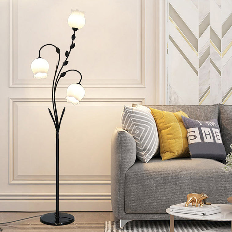 Lampadaire moderne minimaliste en fer en forme de fleur avec trois lumières en verre pour salon 