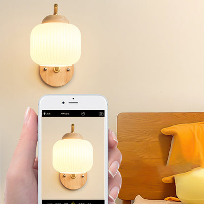 Lámpara de pared de 1 luz de cilindro redondo minimalista moderno con rayas de vidrio y madera para dormitorio 