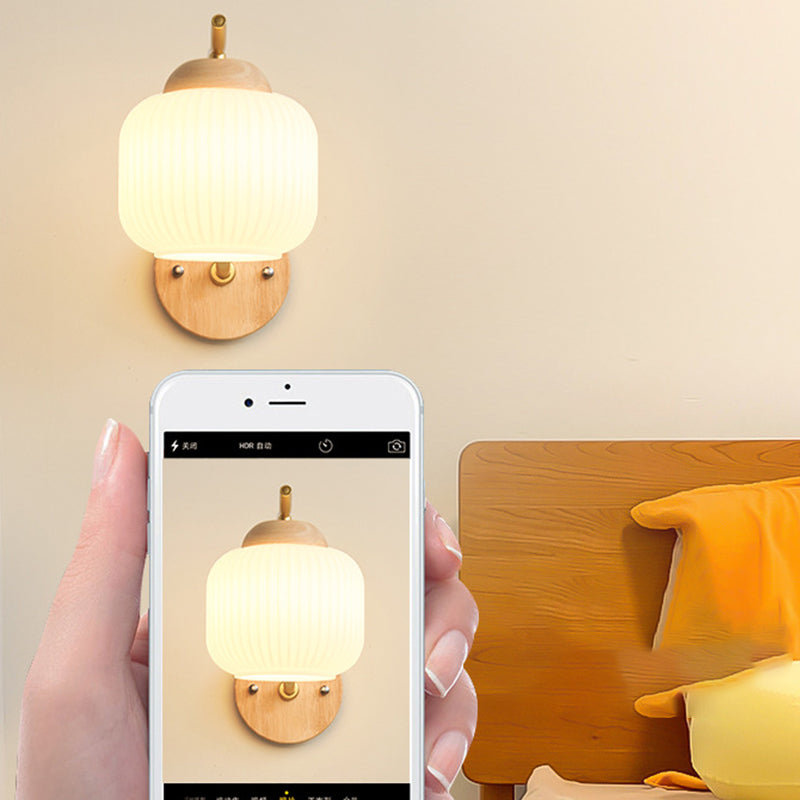 Lámpara de pared de 1 luz de cilindro redondo minimalista moderno con rayas de vidrio y madera para dormitorio 