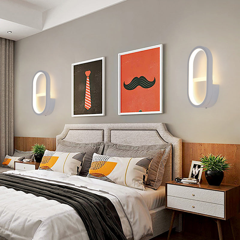 Applique murale LED ovale minimaliste moderne en fer, aluminium et acrylique pour chambre 