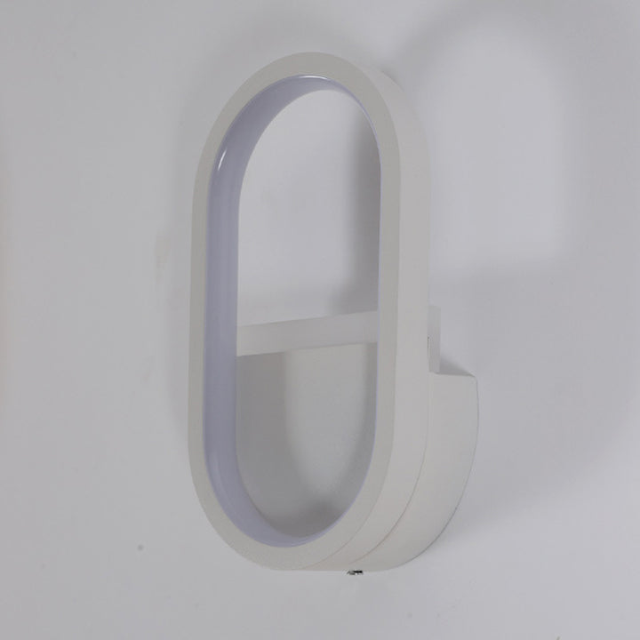 Applique murale LED ovale minimaliste moderne en fer, aluminium et acrylique pour chambre 