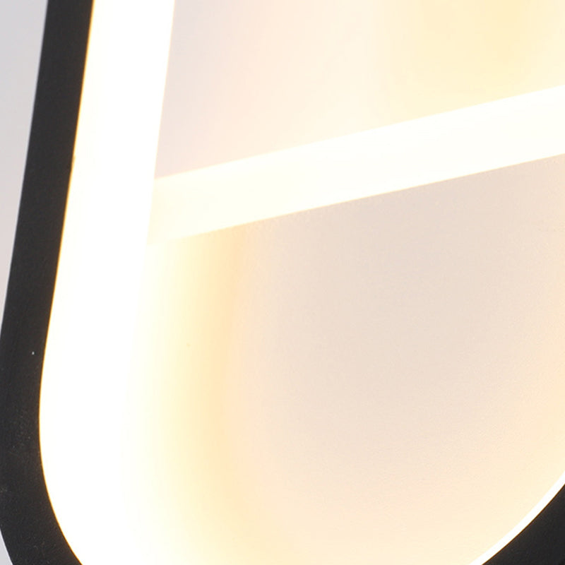 Applique murale LED ovale minimaliste moderne en fer, aluminium et acrylique pour chambre 