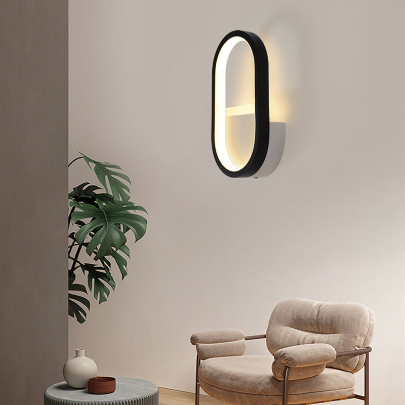 Applique murale LED ovale minimaliste moderne en fer, aluminium et acrylique pour chambre 